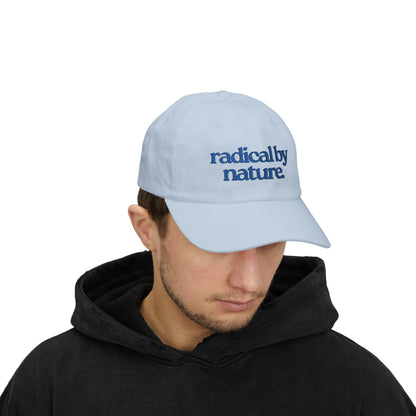 “radical by nature.” — Embroidered White Baseball Hat
